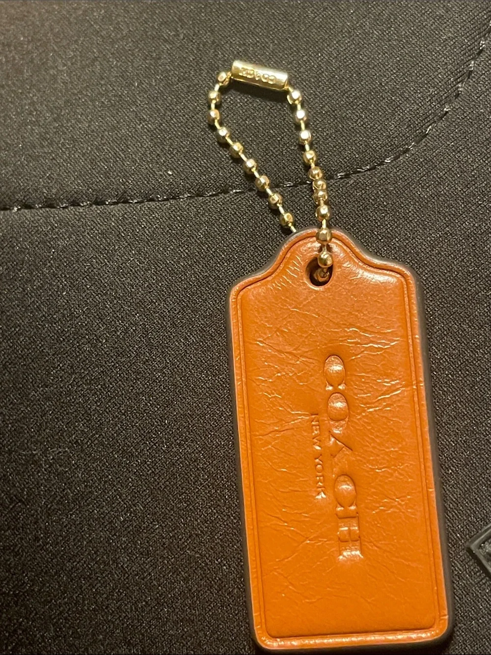 Coach Leather Tag Key Fob in Tan Orange with Gold Chain. (2.5 in)